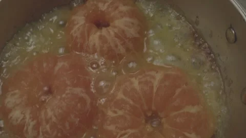 Chef skillfully prepares a dish in a charming miniature kitchen using tiny Video stock 286901993