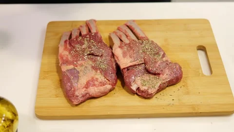 The chef skillfully seasons the meat, giving it a rich flavor. The meat, the Stock Footage 270392333