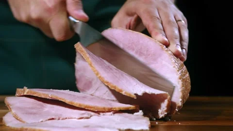 Chef slice ham Stock Footage 223583530