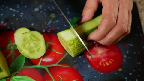 The chef slices a cucumber Stock Footage 161223606