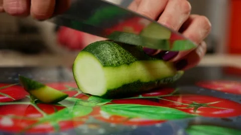 The chef slices a cucumber Stock Footage 161223634