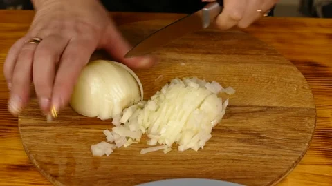 Chef slices onions Stock Footage 231159481