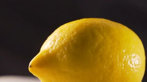 Chef slices ripe lemon Stock Footage 116687195