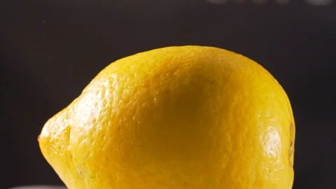 Chef slices ripe lemon Stock Footage 116687272