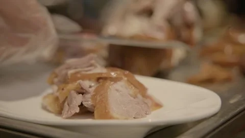 Chef Slicing and Plating Roast Meat in Beijing Restaurant Kitchen, Close Up Stock Footage 345849987