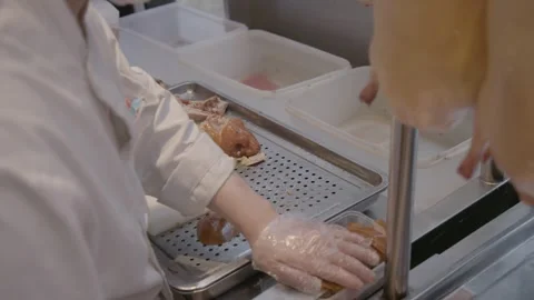 Chef Slicing and Preparing Roasted Poultry in Restaurant Kitchen, Beijing, China Stock Footage 345851932