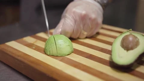 Chef Slicing Avocado Stock Footage 151417553