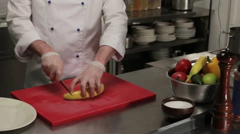 Chef slicing a banana, medium shot 動画素材 66053271
