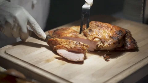 Chef Slicing a Chicken Stock Footage 119039267