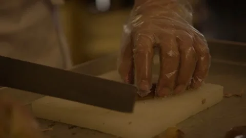 Chef Slicing Cooked Meat on Cutting Board in Beijing Restaurant Kitchen Close Up Stock Footage 345785530