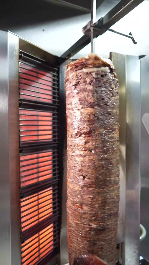 The chef slicing delicious doner or shawarma. Story size Stock Footage 294948623