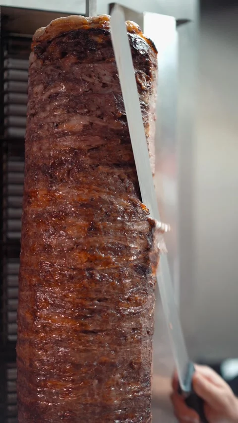 The chef slicing delicious doner or shawarma. Story size Stock Footage 294948762