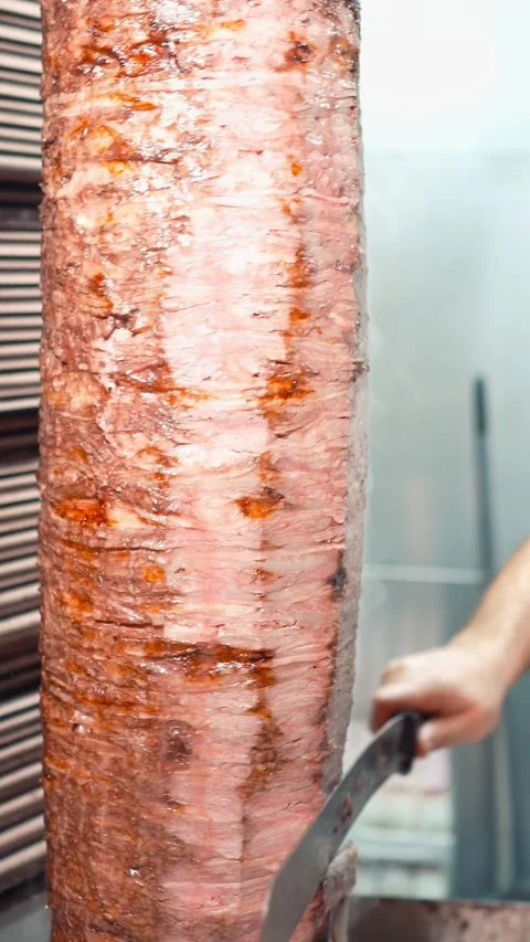 The chef slicing delicious doner or shawarma. Story size Stock Footage 294949150
