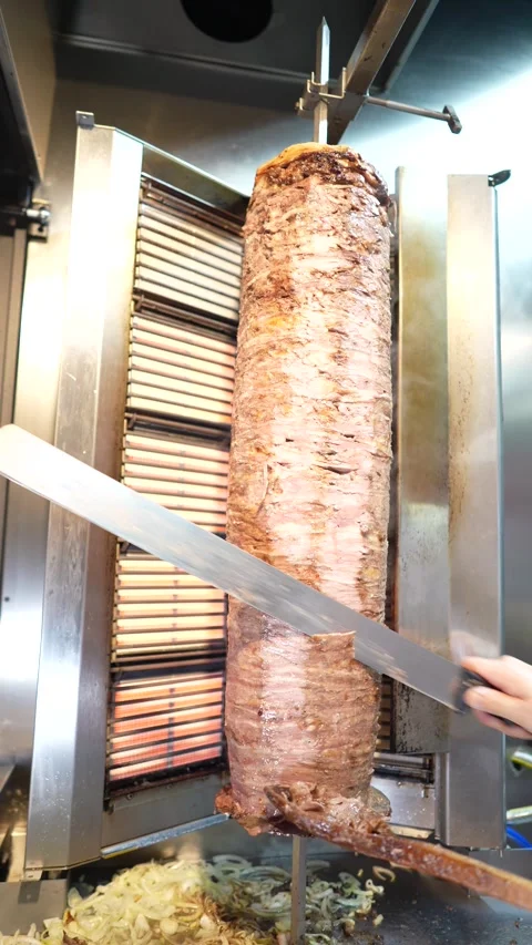 The chef slicing delicious doner or shawarma. Story size Stock Footage 294950959