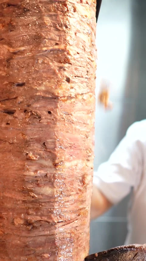 The chef slicing delicious doner or shawarma. Story size Stock Footage 294955153