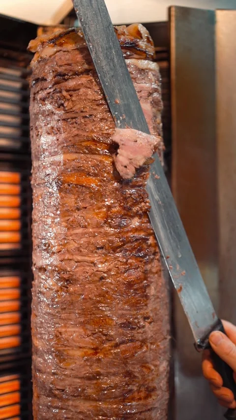 The chef slicing delicious doner or shawarma. Story size Stock Footage 294955754