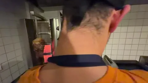 Chef slicing doner kebab meat at restaurant Stock Footage 336232908