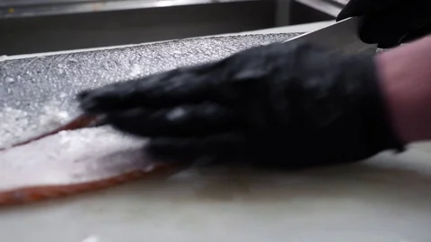 Chef Slicing Fish and Removing Scales Video stock 128927394