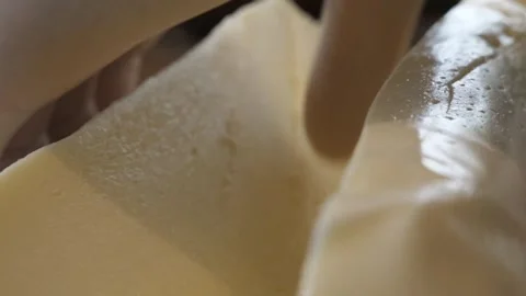 Chef Slicing Fresh Block of Italian Mozzarella Cheese with Knife Stock Footage 337677345
