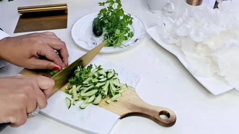 Chef Slicing Fresh Cucumber and Parsley with Gold Knife ASMR 4K 스톡 동영상 333373145