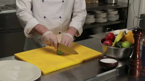 Chef slicing a lime, medium shot 库存影片 66061019