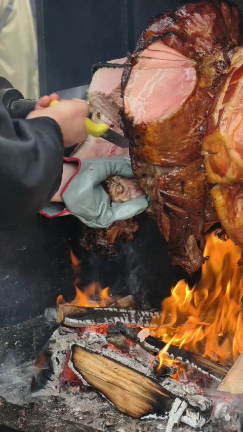 Chef Slicing Meat Over Open Wood Fire Stock Footage 332163008