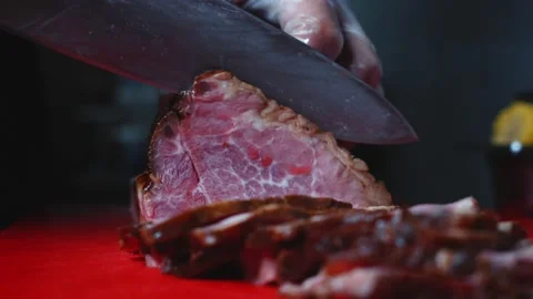 Chef Slicing Meat with Sharp Knife Close Up Stock Footage 339772252