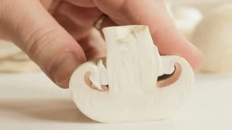 Chef slicing mushroom Stock Footage 12681930