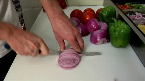 Chef slicing onions 03 Stock Footage 24632459