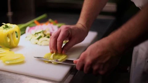 Chef Slicing Peppers Video stock 72922393