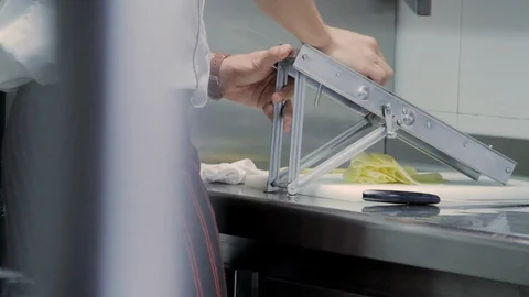 Chef Slicing Potato Chips on Restaurant Kitchen Stock Footage 110477731