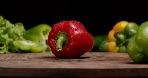 Chef slicing red pepper to cook vegetarian salad. Stock Footage 125416337