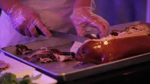 Chef Slicing Roasted Meat in Beijing Restaurant Kitchen, Close-Up Food Stock Footage 345744250