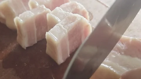 Chef Slicing Thick Slices of Raw Pork Belly on Wooden Board Video stock 337621519