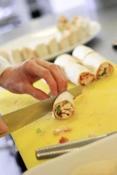 Chef slicing wrap Foto stock
