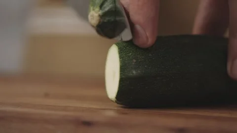 Chef Slicing Zucchini in Handheld Close-Up, Rondelle Cut Stock-Footage 323750341