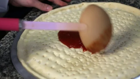 Chef smears sauce on the cake. Stock Footage 87636141