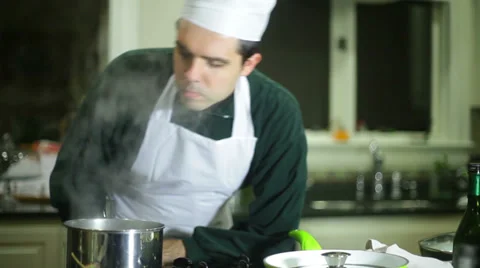 Chef smelling really bad food Stock Footage