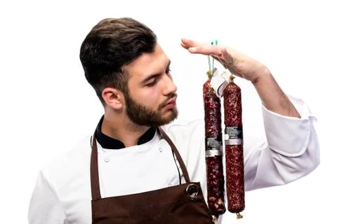 Chef smelling the salami Stock Photos