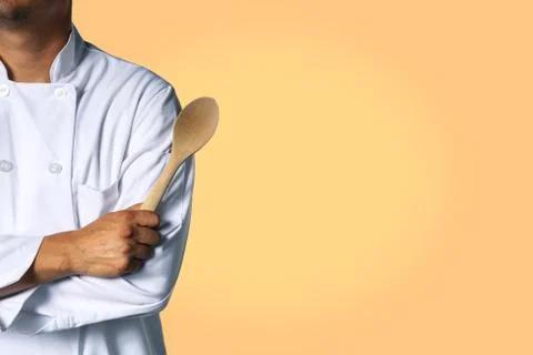 Chef with a spoon background Stock Photos