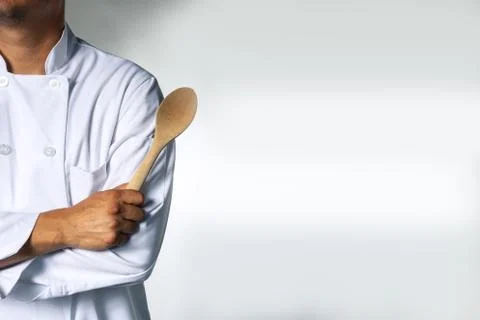 Chef with a spoon background with space for text Stock Photos