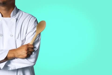 Chef with a spoon background with space for text Stock Photos