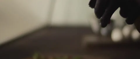 Chef spreading olive oil over a ready burrata al taglio pizza. Close up, slow Stock Footage 146604677