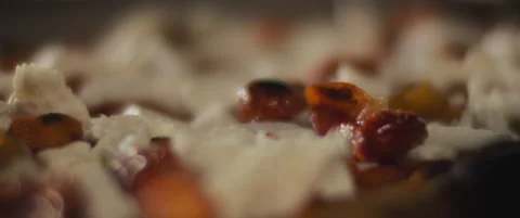 Chef spreading red peppers over a ready burrata al taglio pizza. Extreme clos Stock Footage 146605764