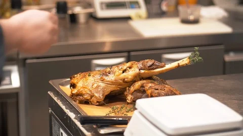The chef sprinkles the finished dish. Video stock 125057379