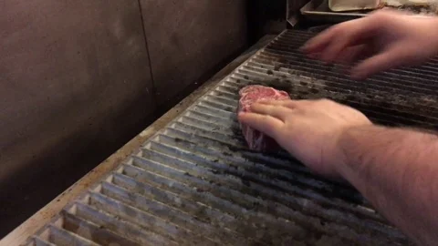 Chef Sprinkles Salt on Steak Video stock 82315949