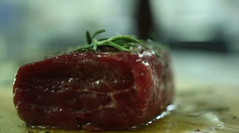 Chef sprinkles spice steak Stock Footage 61851542