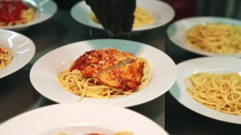 Chef Sprinkling Grated Parmesan Cheese Over Grilled Chicken Spaghetti Stock Footage 342219430