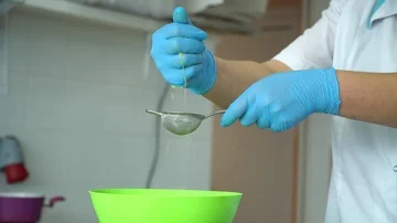 The chef squeezes the juice Stock Footage 85668272