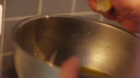 Chef squeezes a lemon Stock Footage 12752286